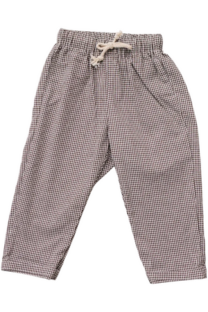 Brown plaid cotton pants featuring a comfortable, relaxed fit and an adjustable drawstring waist, ideal for childrens everyday adventures and play. Made from soft, breathable fabric for all-day comfort.