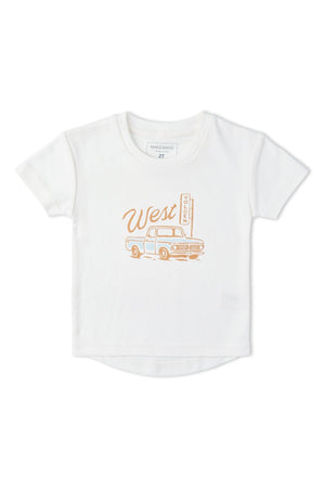 A soft white organic cotton t-shirt features a retro truck graphic with West text, perfect for adventurous young explorers. Ideal for casual wear, it promotes comfort and playful style.