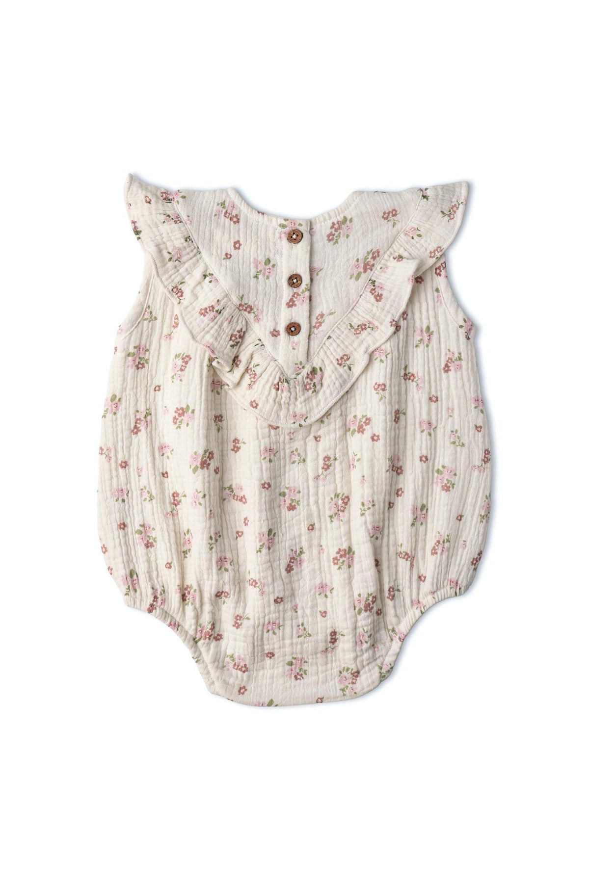 Organic sleeveless ruffle bubble romper in blush floral features soft, breathable fabric, whimsical patterns, and easy snap closures. Ideal for keeping little ones cool and comfortable during playtime.