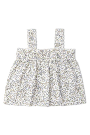 A soft, sleeveless top featuring a floral pattern in pastel colors, with scalloped straps and a relaxed fit. Ideal for warm weather, it combines style and comfort for young children.