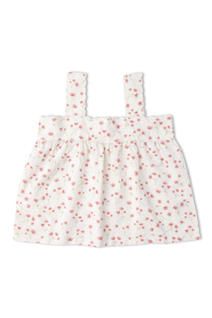 White top featuring delicate pink floral patterns, scalloped straps, and a relaxed fit. Made from a soft, breathable fabric, this stylish piece is perfect for warm-weather outings.