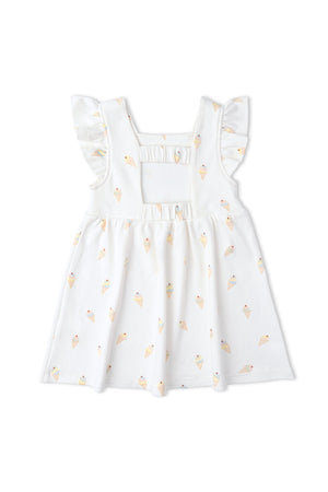 A playful white dress featuring an ice cream print and ruffled sleeves. The back has a charming cutout design, made from soft, breathable organic cotton for comfortable wear.