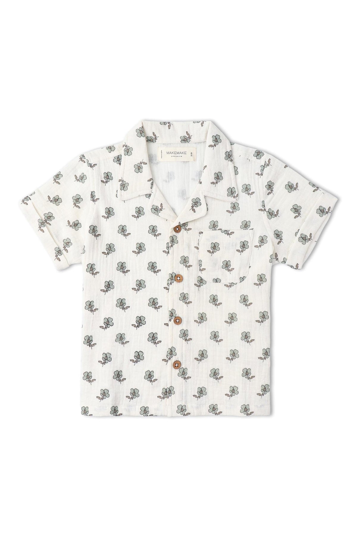 Lightweight, short-sleeve shirt featuring a cream background with a floral print in green and brown. Made from organic cotton, its perfect for keeping kids cool in summer.
