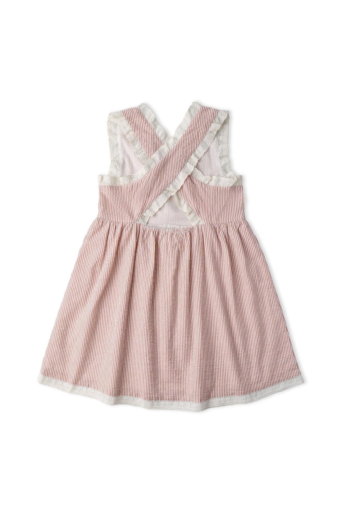 Back view of a coral-striped organic cotton dress featuring criss-cross straps and a gently gathered skirt, perfect for warm-weather wear. Ideal for children seeking comfort and style.