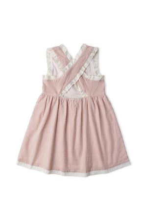 Back view of a coral-striped organic cotton dress featuring criss-cross straps and a gently gathered skirt, perfect for warm-weather wear. Ideal for children seeking comfort and style.