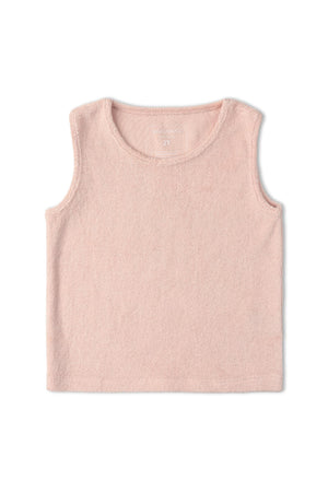 Light blush sleeveless tee made from soft, organic terry fabric. This cozy top features a relaxed fit, perfect for warm days or casual lounging.