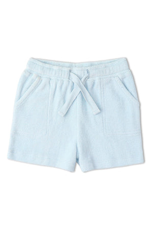 Light blue terry shorts featuring a soft, towel-like texture, an elastic waistband with a drawstring, and two front pockets. Ideal for casual summer wear and comfortable lounging.