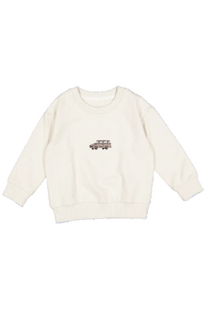 Cream-colored cotton sweatshirt featuring a vintage car embroidered on the front. Ideal for toddlers, this cozy garment is perfect for outdoor adventures or lounging at home.