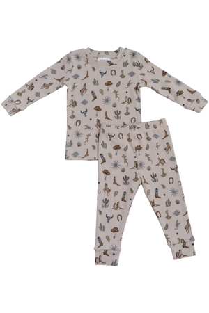 Light beige cotton pajama set featuring playful desert-themed illustrations, including animals and cacti. Ideal for childrens comfort during sleep or play, made from soft, breathable fabric.