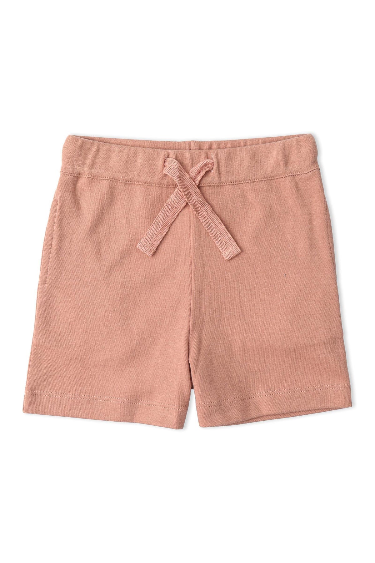 Soft, organic cotton shorts in a blush pink hue with a drawstring waist, perfect for children’s casual wear. Ideal for comfort and playful activities, promoting sustainable fashion choices.