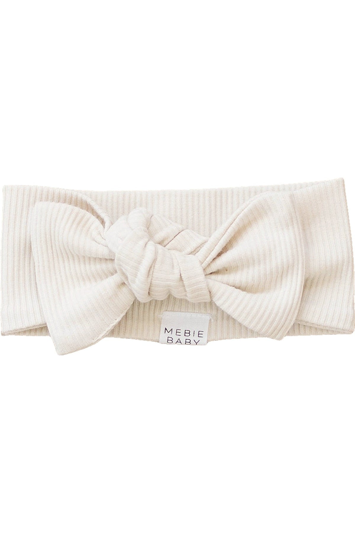 Cream-colored ribbed head wrap with a bow and a Mebie Baby label, made from organic cotton.