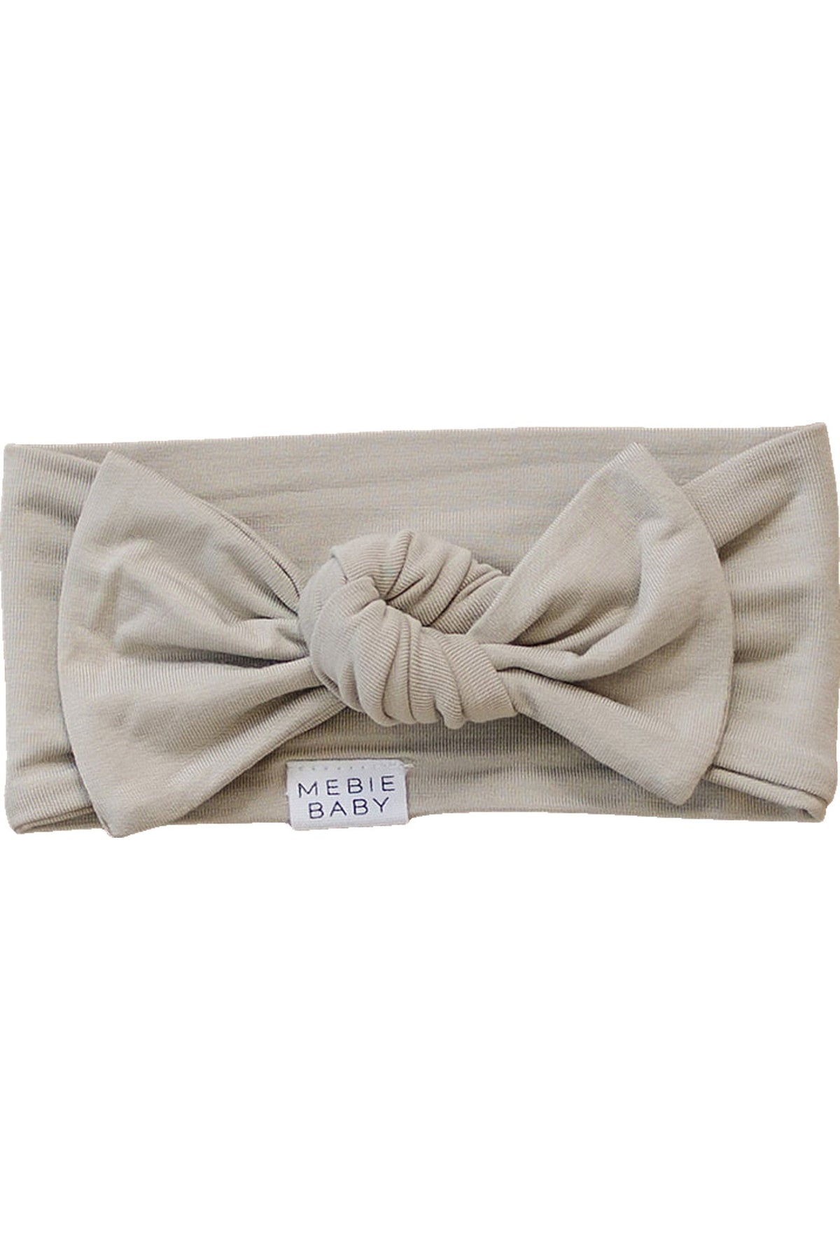 Beige head wrap with a large bow, made from bamboo fabric. Features a Mebie Baby label.