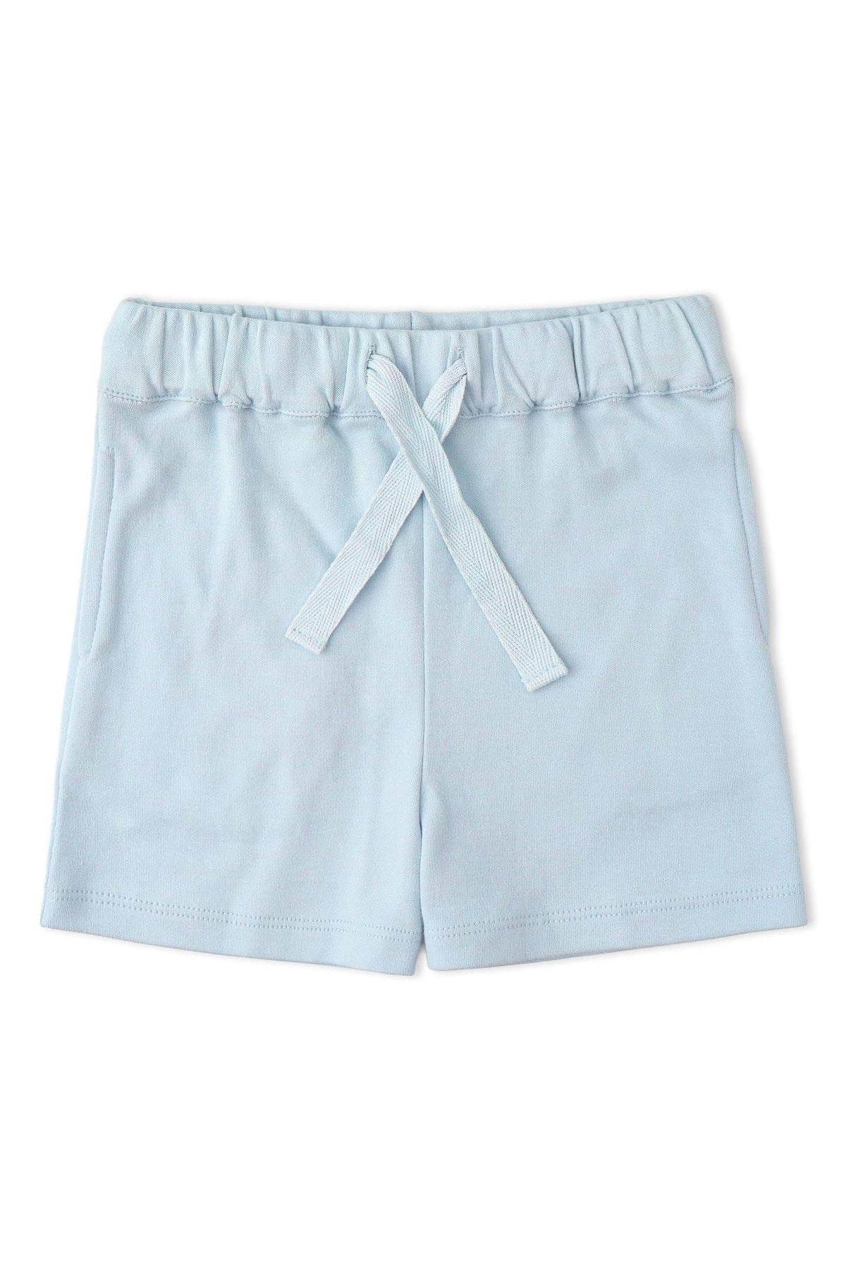 Light blue organic cotton shorts with an elastic waistband and drawstring, featuring a simple design and a soft, breathable fabric suitable for childrens active play. Ideal for comfort and style.