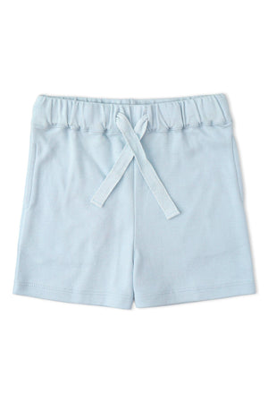 Light blue organic cotton shorts with an elastic waistband and drawstring, featuring a simple design and a soft, breathable fabric suitable for childrens active play. Ideal for comfort and style.
