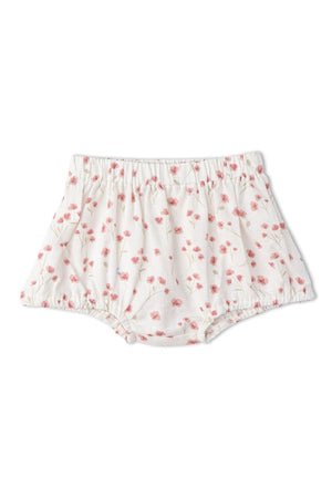 Lightweight bloomers featuring a soft, floral print in pink and cream, made from breathable organic cotton. Ideal for warm weather, these comfortable bottoms are perfect for young children.