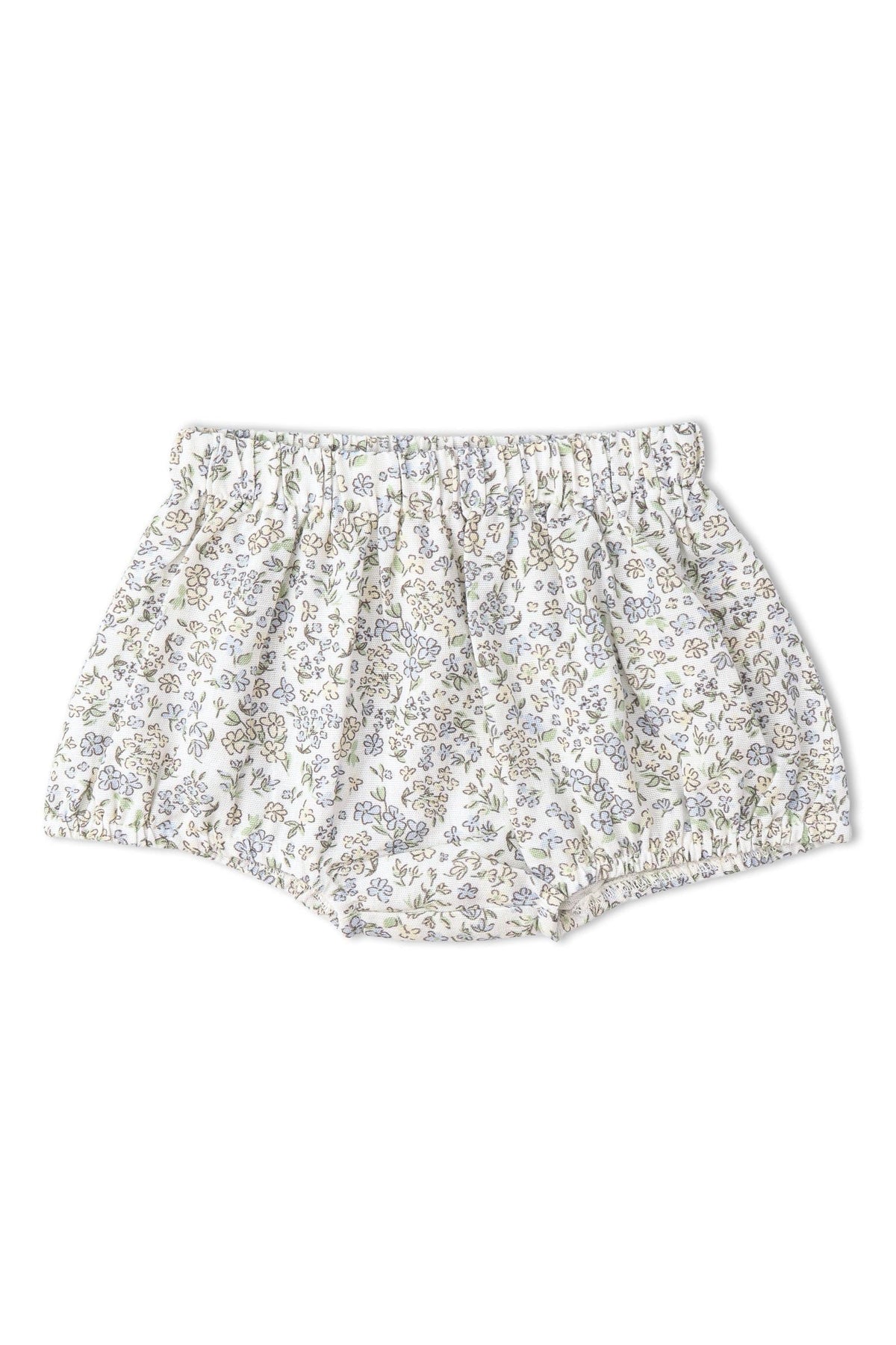 Floral bloomers in soft white fabric adorned with delicate lavender and green flowers. The relaxed fit and gathered waistband offer comfort, perfect for warm-weather play. Ideal for children’s casual outfits.