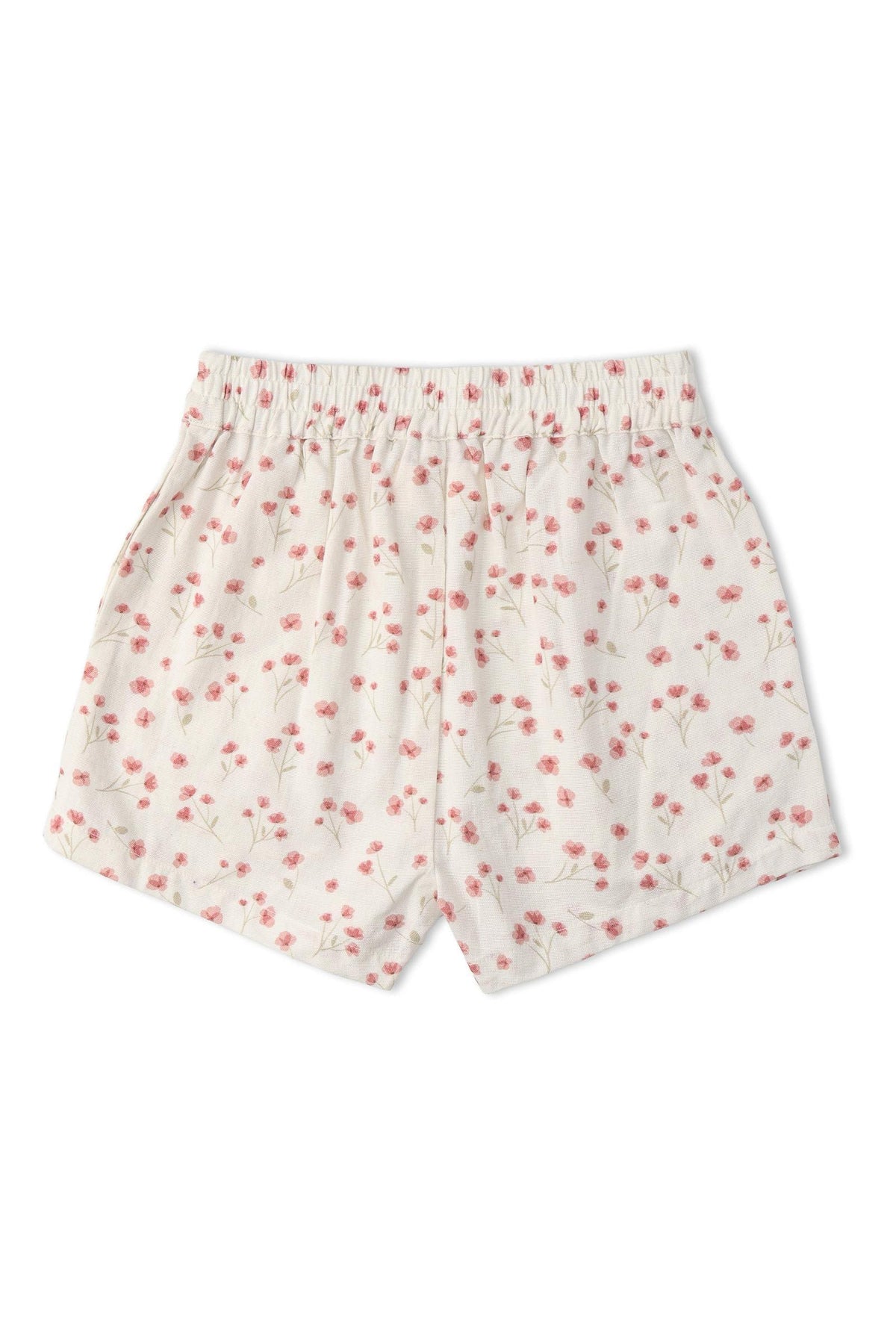 White shorts featuring a delicate pink floral pattern, made from soft organic cotton. The design includes an elastic waistband, ideal for comfort during warm-weather play.