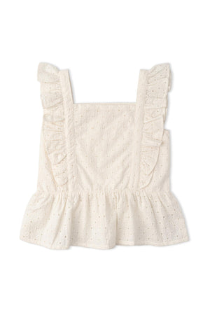 An ivory eyelet flutter top featuring delicate ruffles along the shoulders and a peplum hem. Made from organic cotton, this lightweight top is perfect for warm-weather outings.