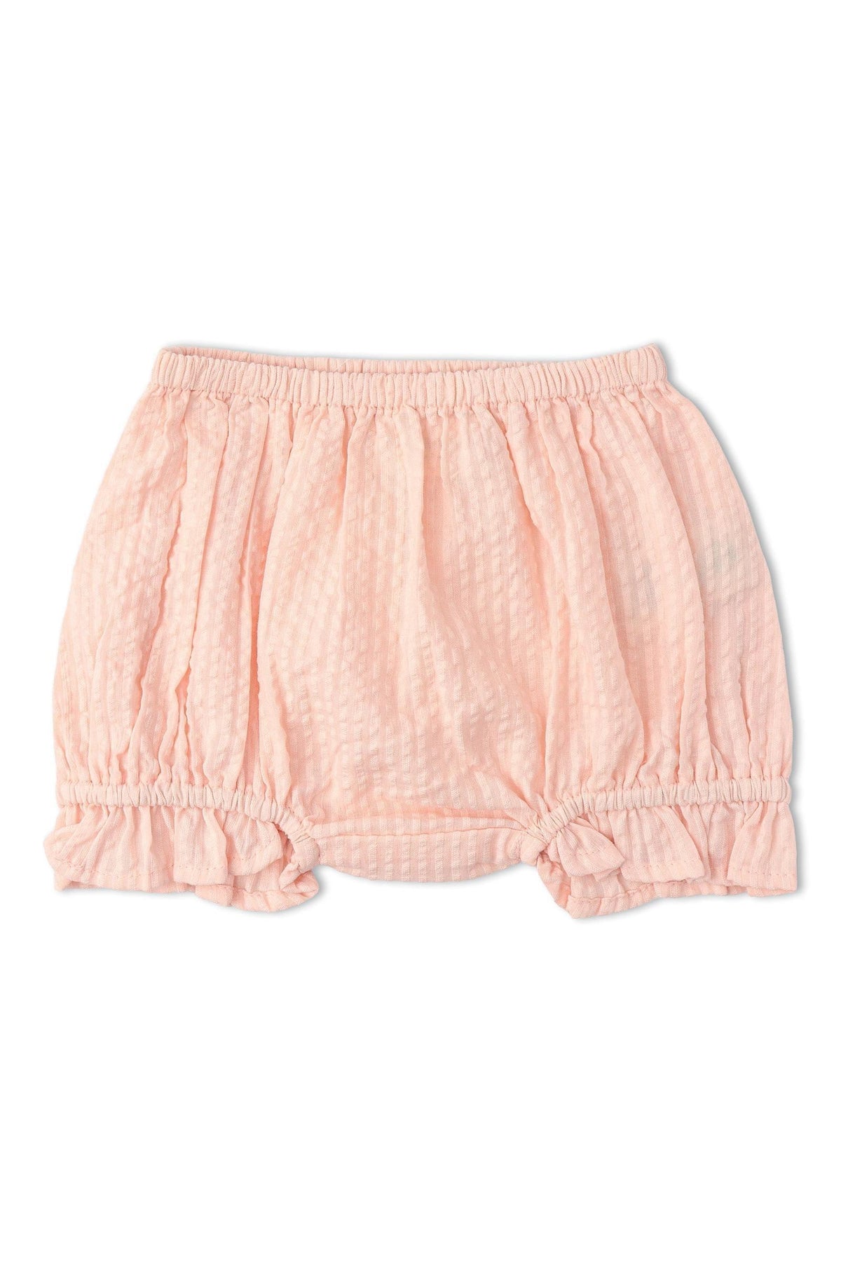 Light pink organic cotton bloomer with a textured seersucker pattern, featuring gathered elastic at the waist and ruffled leg openings, ideal for keeping little ones comfortable and stylish.