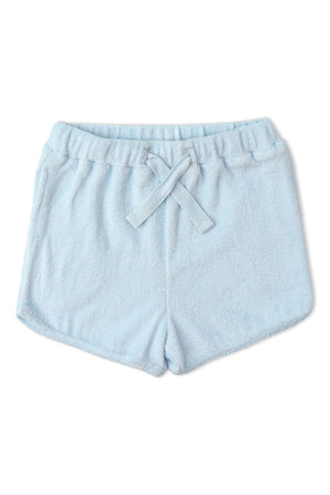 Light blue terry cloth shorts with a relaxed fit and elastic waistband, perfect for lounging or play. Made from organic materials, these shorts are soft and comfy for kids.