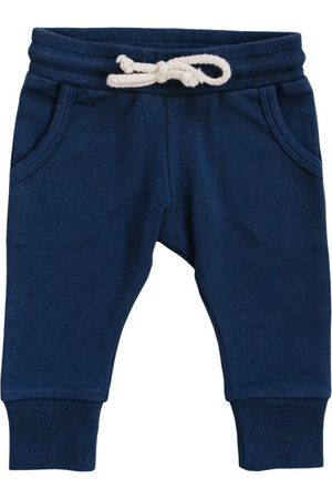 Navy cotton joggers feature a soft, lightweight material with an elastic waistband and functional drawstring. Designed for kids, these joggers include two front pockets for convenience.