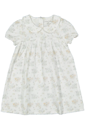 A light cream dress featuring a delicate floral pattern and a classic collar, perfect for toddlers. The dress is made from soft, sustainable fabric, ensuring comfort for young children.