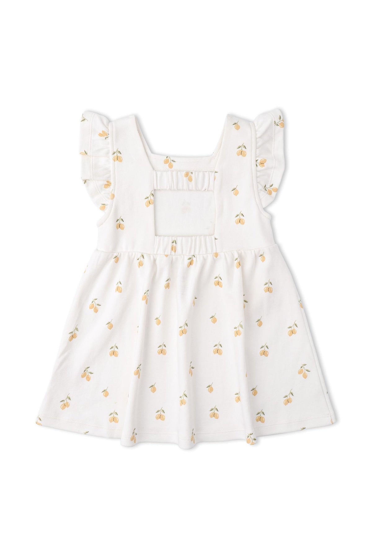 A white cotton dress featuring a cheerful lemon print, with ruffled sleeves and a cutout back. This organic dress is designed for comfort and style for young children.