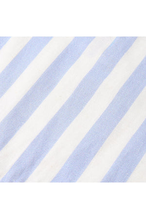 Close-up of a fabric featuring light blue and white stripes, made from a breathable linen-cotton blend, perfect for creating an organic collared romper for children.
