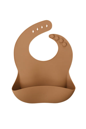 Brown silicone bib with adjustable button closure and pocket, featuring the Mebie Baby logo embossed on the front.