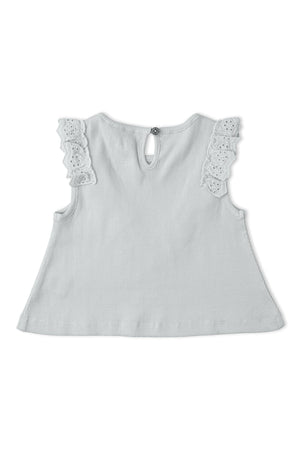Back view of a light gray, sleeveless top featuring delicate ruffle details along the shoulders. The top has a keyhole closure at the back, made from soft, organic cotton.