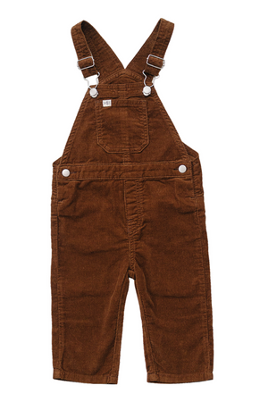 Brown corduroy cotton overalls feature adjustable shoulder straps and a front pocket, showcasing a relaxed fit ideal for toddlers. These stylish overalls are perfect for everyday wear and play.