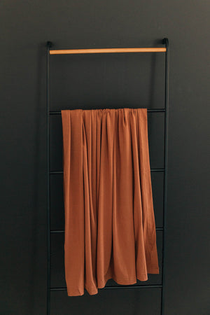 Rust Stretch Swaddle Blanket | Bamboo | Baby Essentials