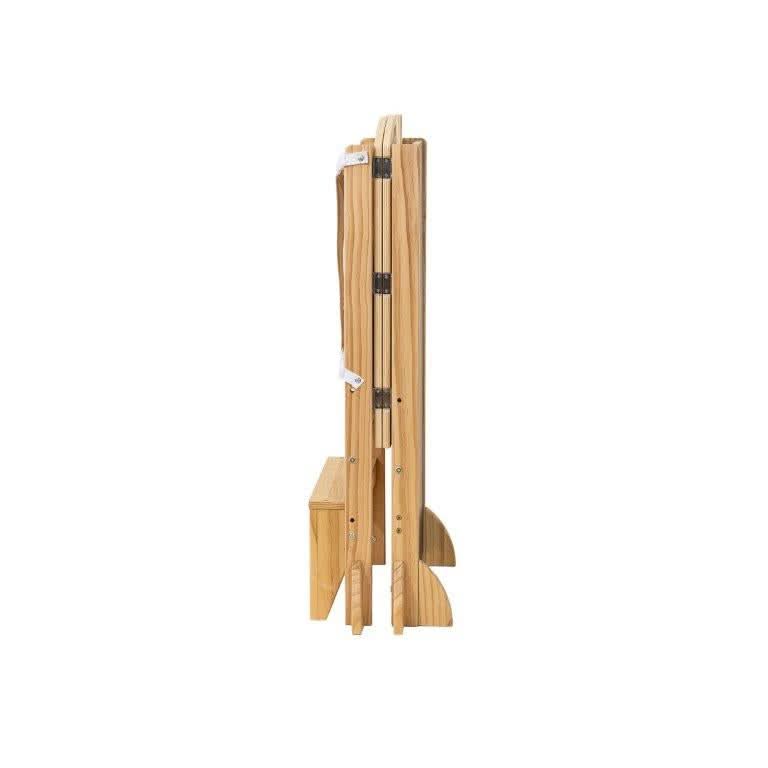 A wooden kitchen tower is shown in a folded position, showcasing its compact design. The natural wood finish highlights its eco-friendly materials, perfect for toddlers activities.