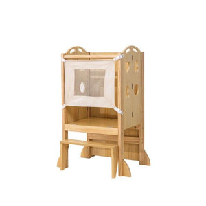 A wooden kitchen tower in a natural bamboo finish features a slide, a chalkboard, and cut-out shapes for ventilation. Its designed for toddlers to safely engage in various activities.