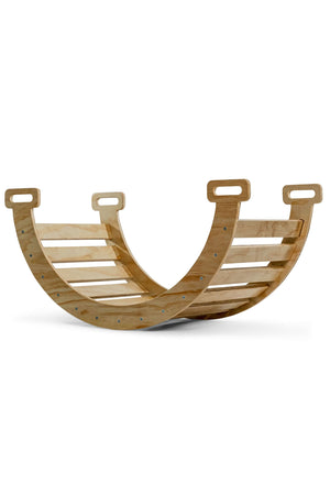 A curved wooden rocker features a smooth, natural finish with sturdy handholds. Designed for toddlers, it promotes balance and imaginative play, while showcasing eco-friendly craftsmanship.