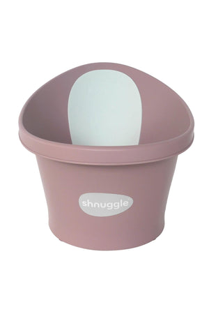 Pink Shnuggle baby bath with a white backrest, featuring a supportive bum bump for newborns.