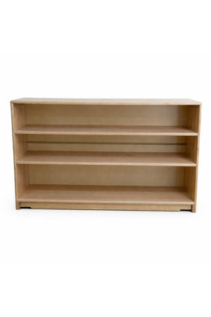A minimalist wooden shelf with three spacious compartments, featuring a smooth birch wood finish. This sturdy organizer is ideal for storing childrens books and toys in a tidy manner.
