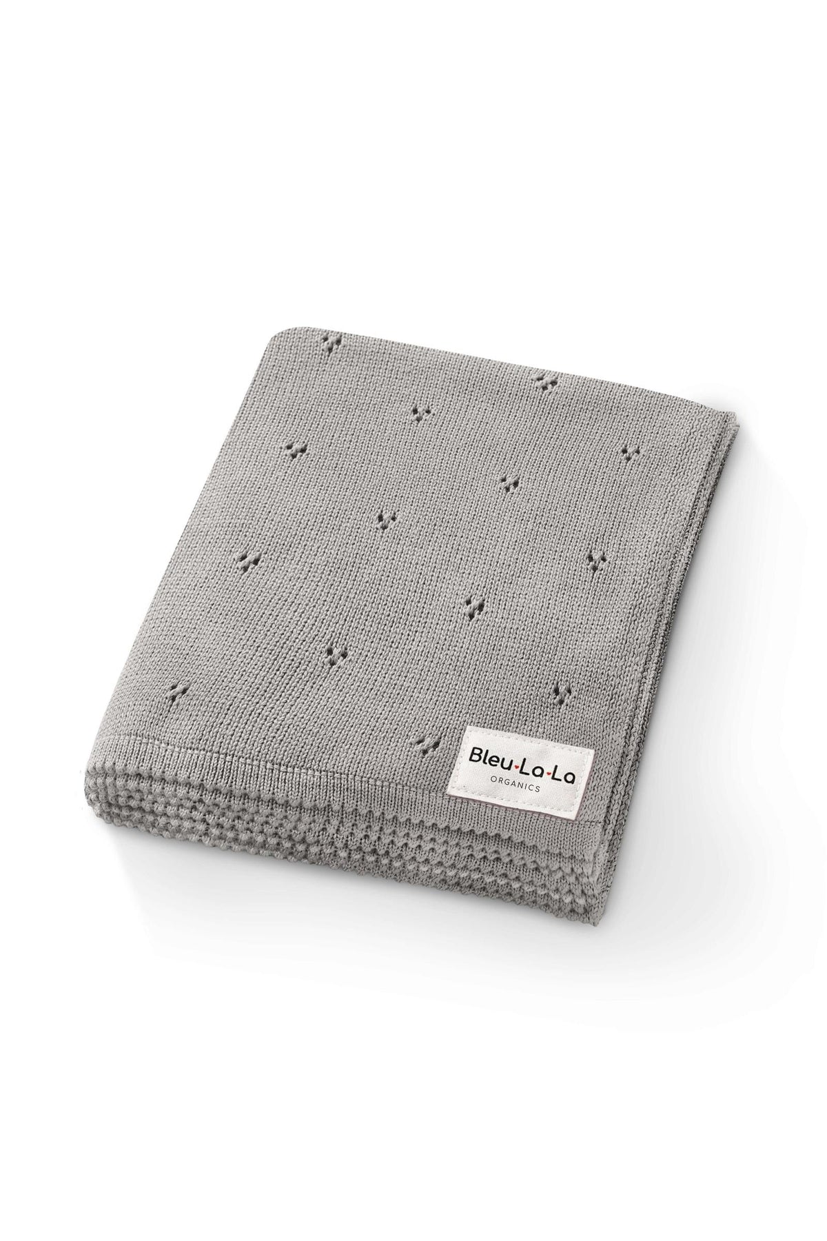 Gray knit blanket with subtle pointelle pattern and a Bleu-La-La Organics label, folded neatly on a white background.