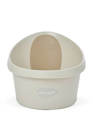 Cream-colored Shnuggle eco toddler bath tub with a beige backrest, designed for comfort and play.