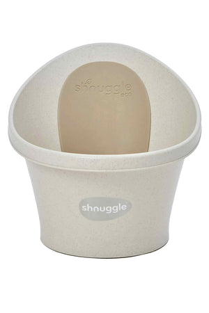 Eco-friendly Shnuggle baby bath in beige, featuring a supportive bum bump and speckled design for newborns.