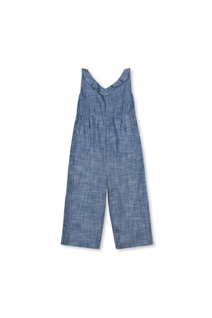 Blue chambray jumpsuit featuring a ruffled neckline and wide legs, made from soft organic cotton for toddlers and kids.