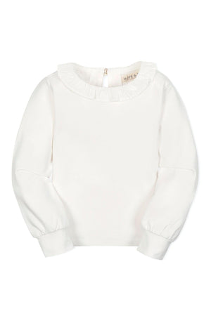 White long-sleeve knit top featuring a ruffle collar and keyhole back closure, made from soft organic cotton for girls.