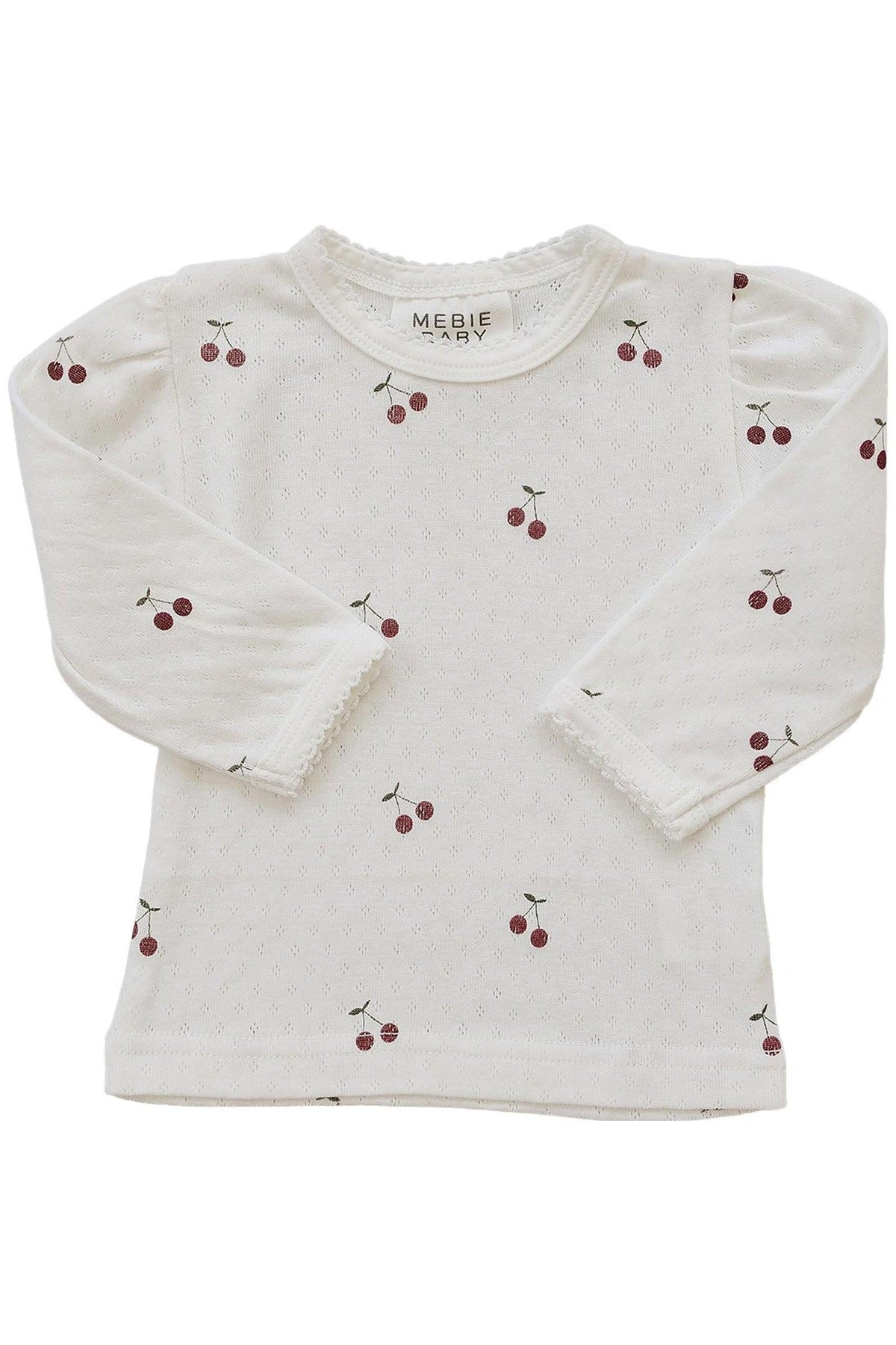 Cream long sleeve t-shirt featuring a cherry print and delicate pointelle texture, made from 100% cotton. Ideal for babies.