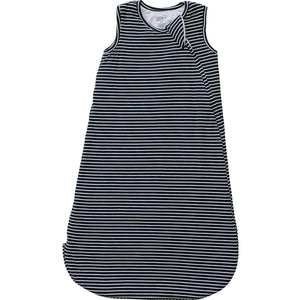 A navy and white striped baby sleep sack lays flat, showcasing its sleeveless design and soft, breathable bamboo fabric. This cozy wearable layer is perfect for keeping little ones comfortable.