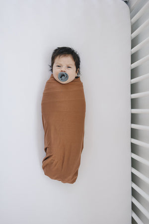 Rust Stretch Swaddle Blanket | Bamboo | Baby Essentials
