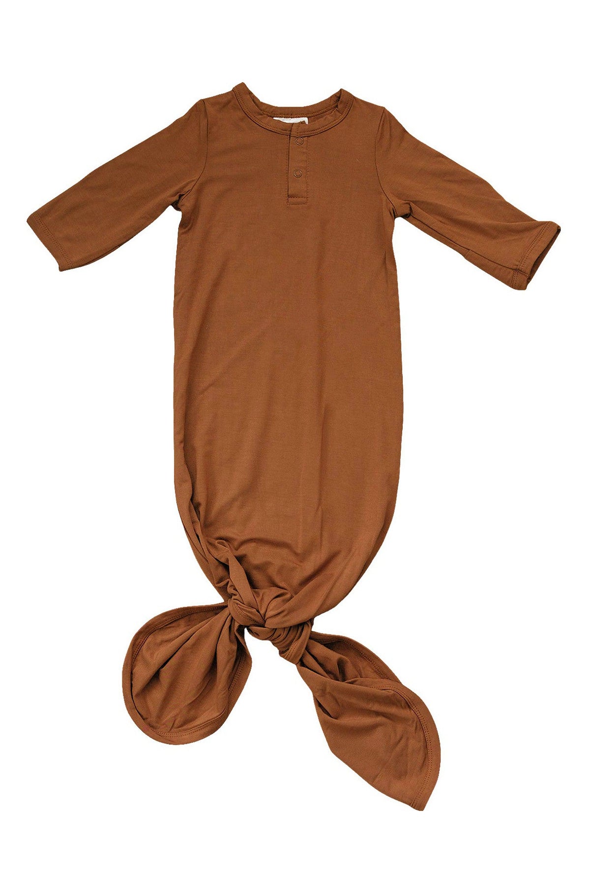 Rust-colored baby gown made of soft bamboo fabric, featuring a knotted bottom and long sleeves.