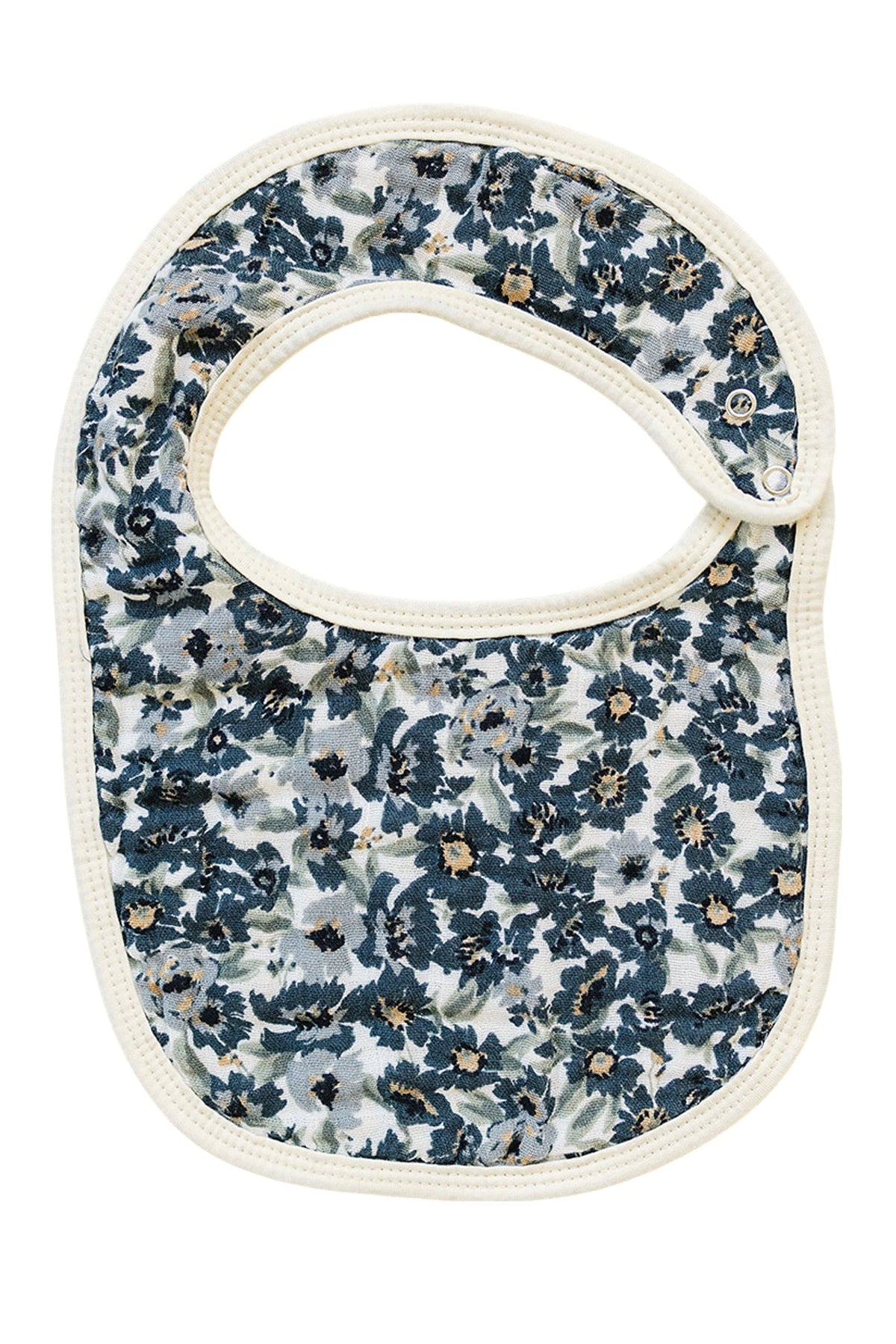 A muslin baby bib featuring a blue and white floral pattern with a rounded shape and snap closure.