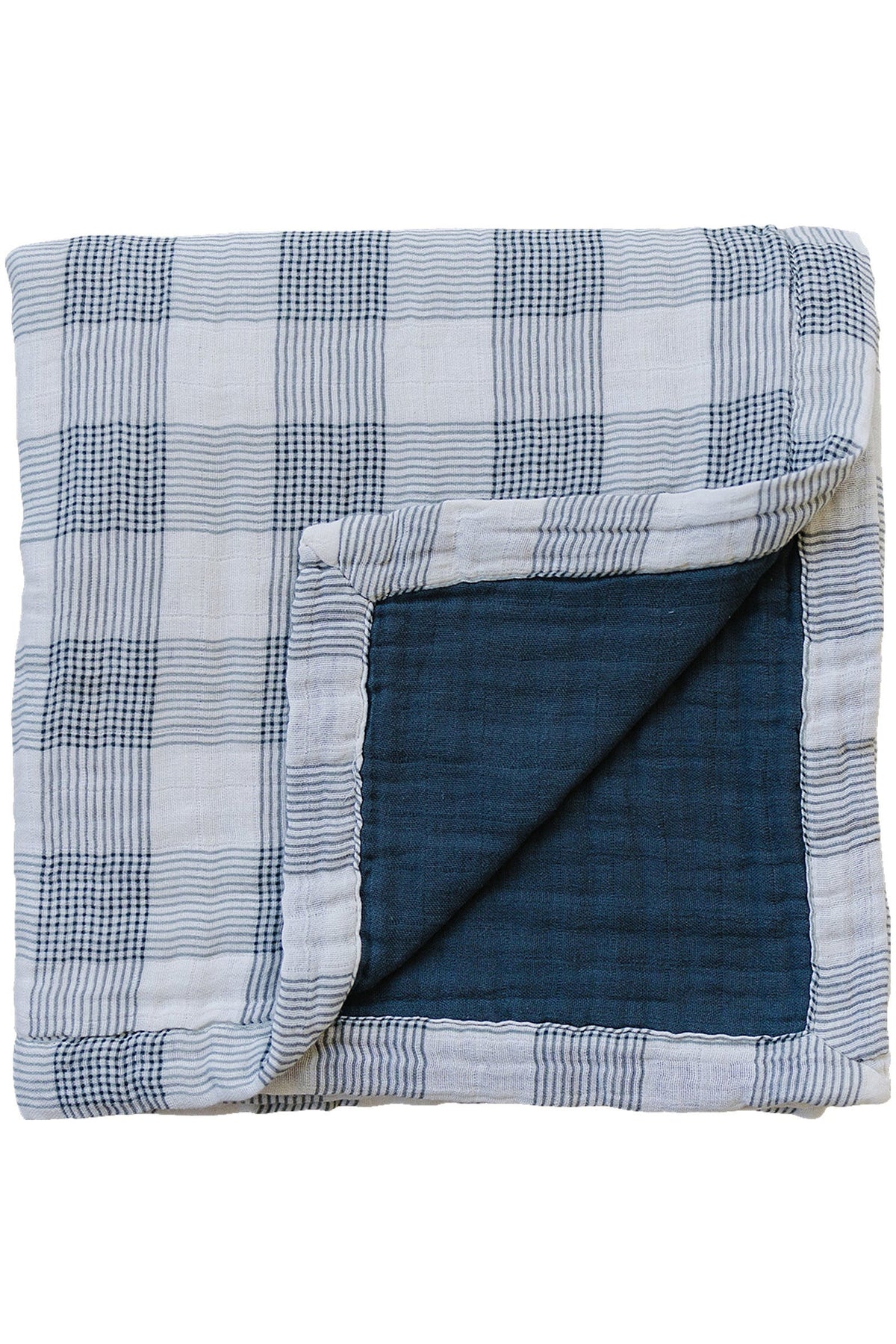 A blue and white plaid muslin crib quilt with a navy underside, showcasing a cozy and elegant design.