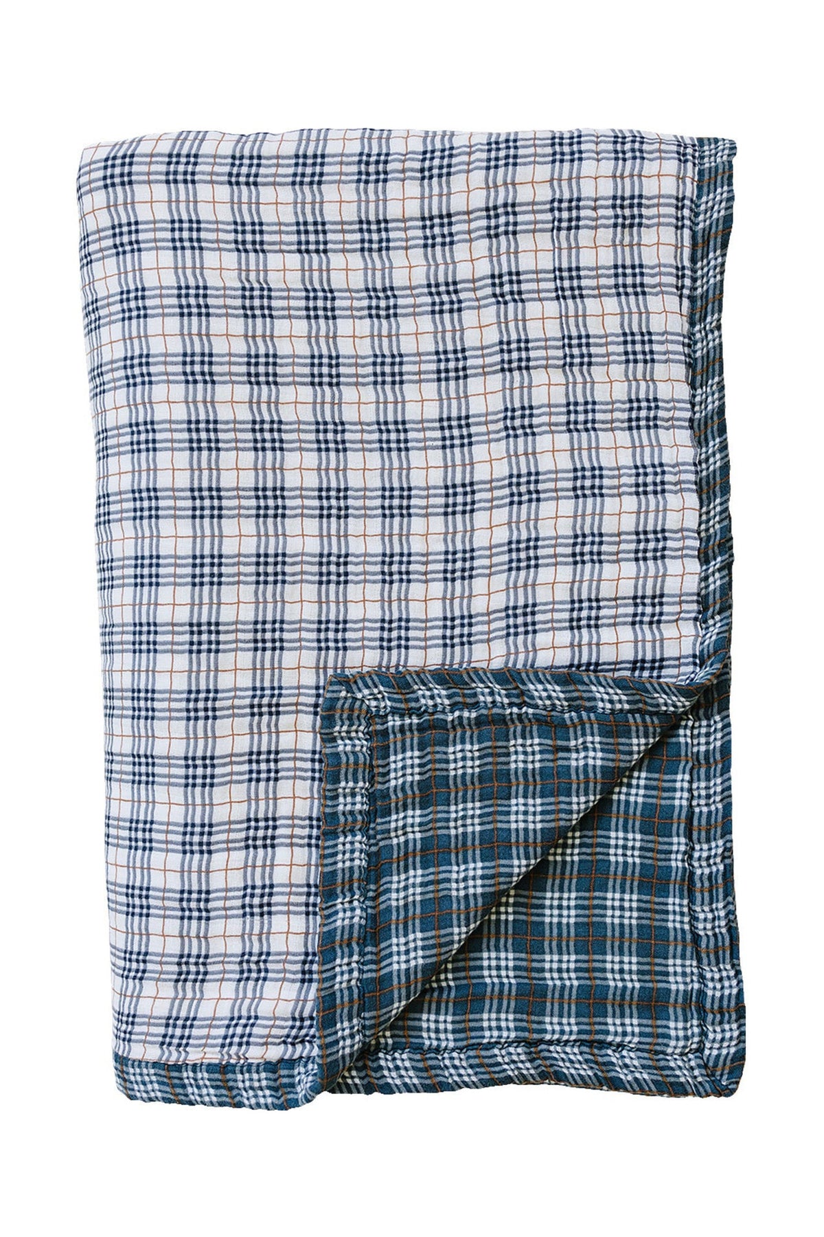 Folded quilt with a vintage plaid pattern in navy and white, showcasing soft, breathable muslin fabric.
