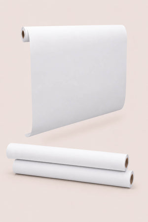 A stack of three white paper rolls is displayed against a soft, neutral background. The rolls are designed for drawing and creative projects, providing ample space for artistic expression.